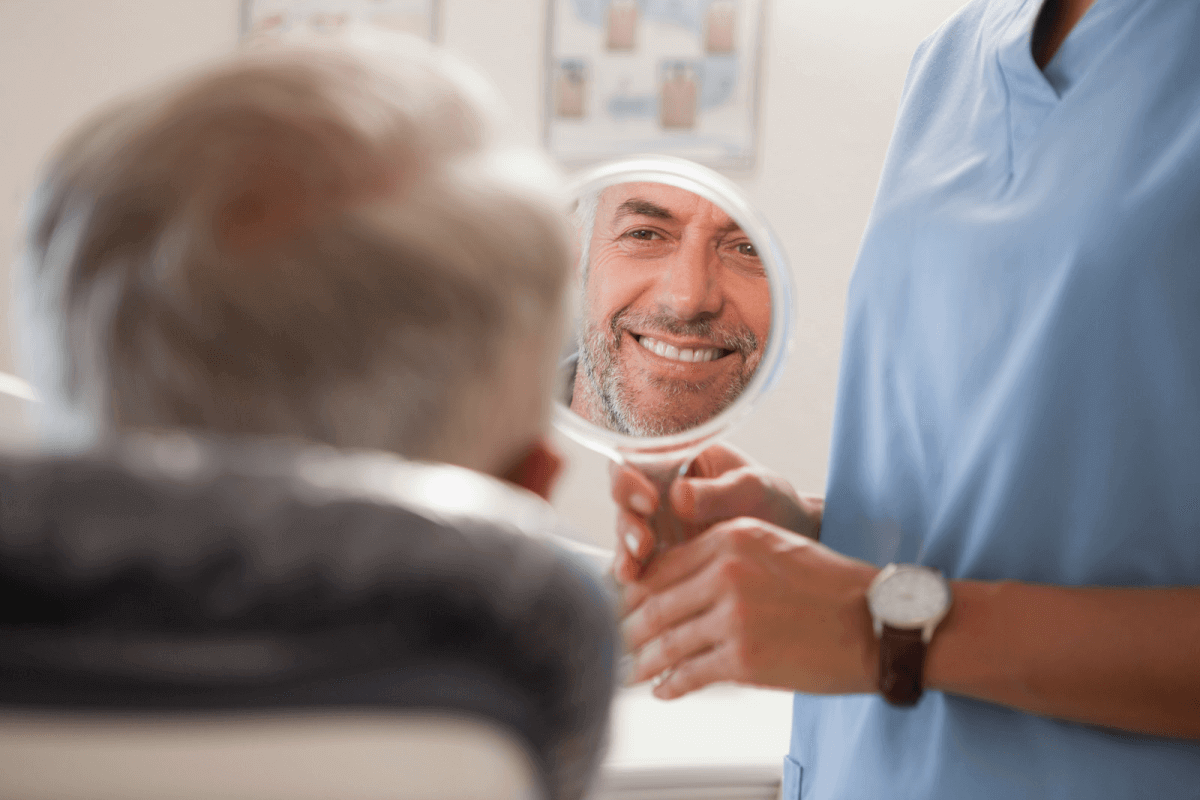 what are the pros and cons of wearing permanent dentures